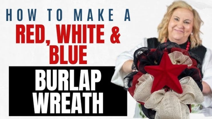 Red, white, and blue deco mesh wreath with layered burlap and large red star centerpiece